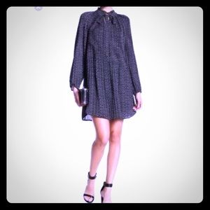 Swing dress with a loose necktie